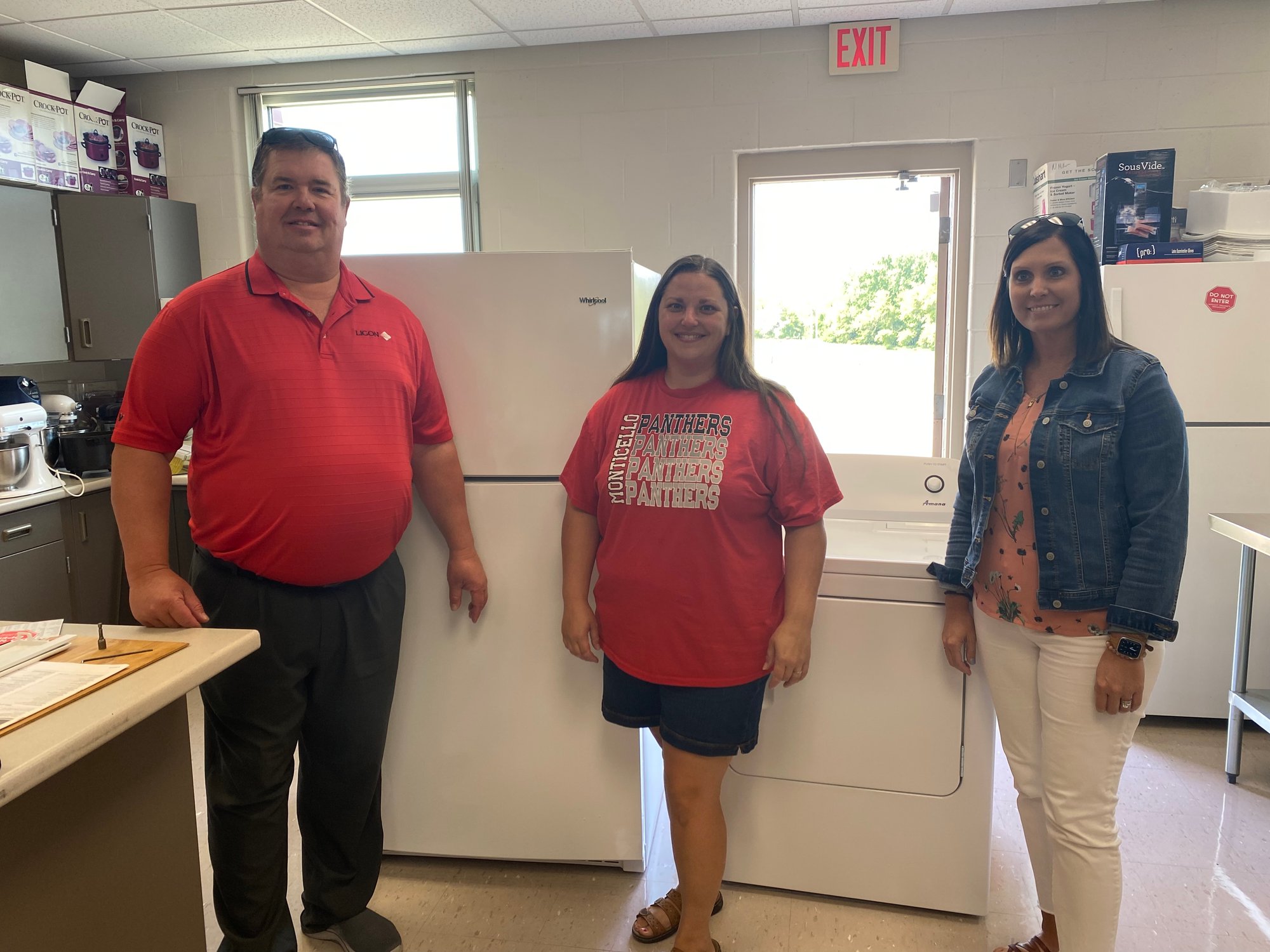 Energy MFG Team donating fridge and dryer